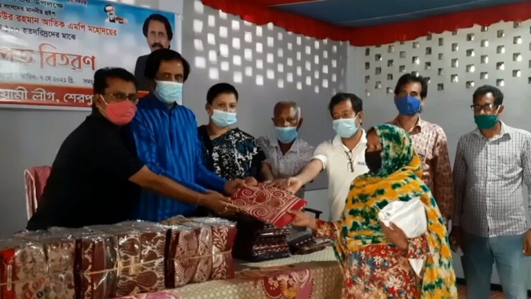 শেরপুরে ঈদুল ফিতর উপলক্ষে হতদরিদ্রদের মাঝে শাড়ী কাপড় বিতরণ